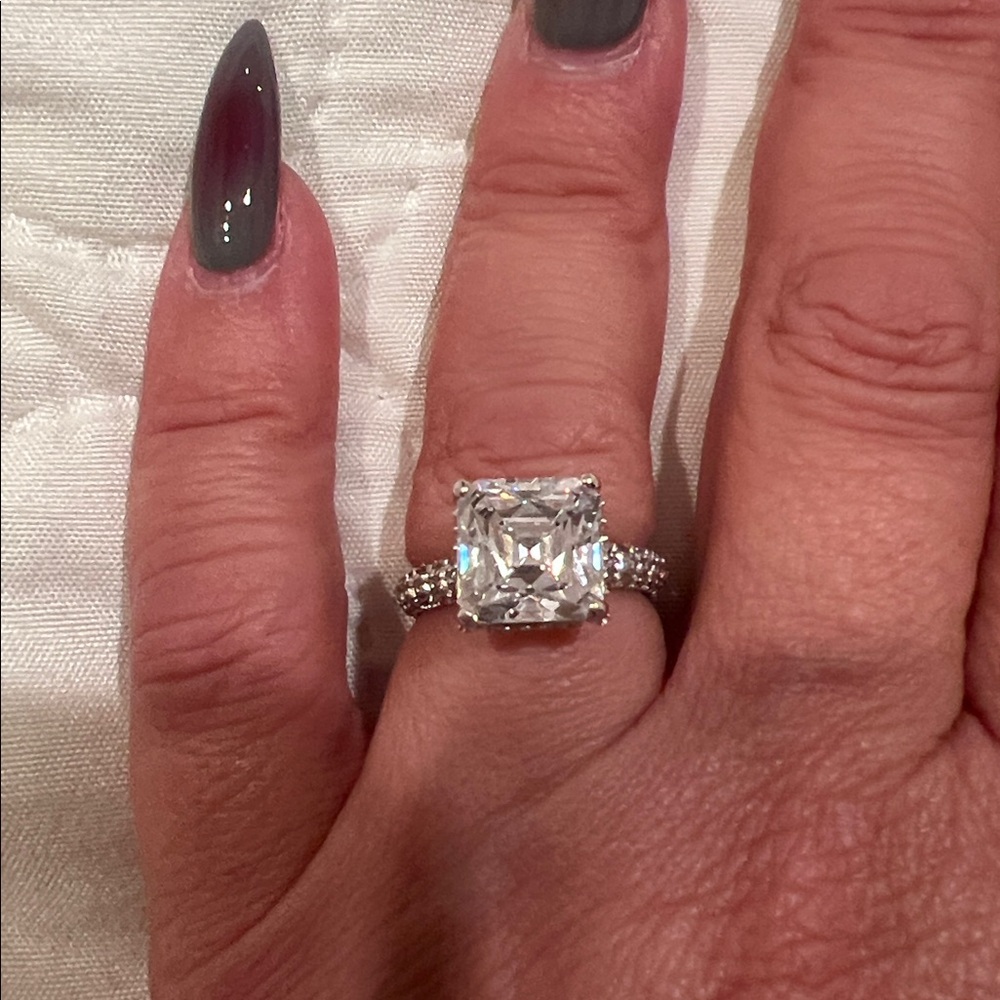 Silver CZ Engagement ring
Pave set basket
Asscher radiant cut stone approx 2 ct.